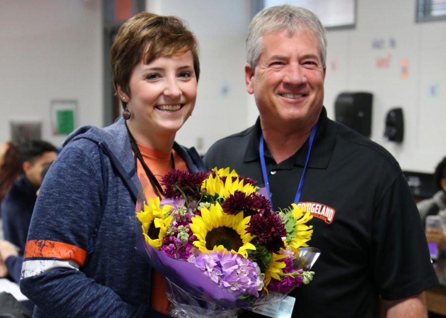 Principal+Mike+Smith+surprises+Dr.+Elizabeth+Braun+in+her+classroom+Jan.+12.