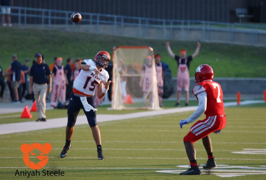 Conner Weigman throws the ball to make a play. 