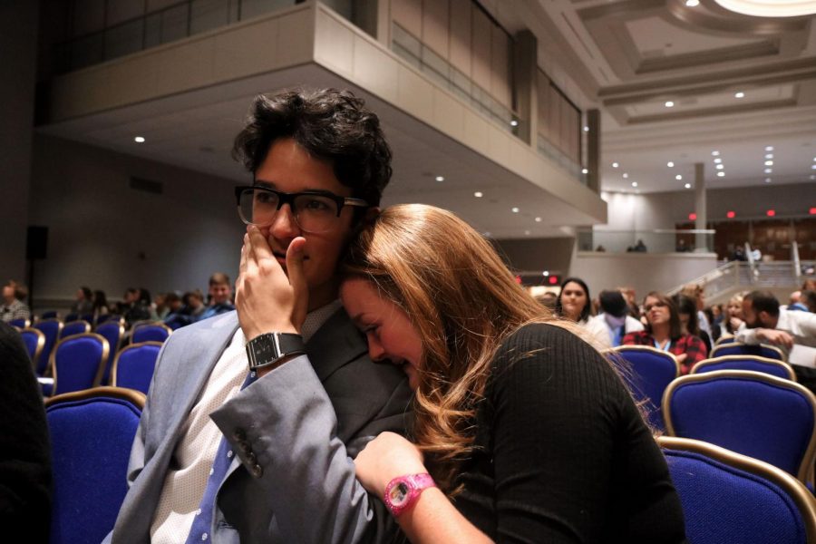 Junior Cara Hudson and junior Tommy Yarrish share emotional moment after receiving their national finalist awards. Yarrish placed second in Social Media Reporting.
