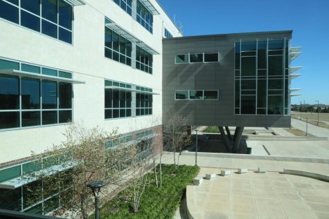 An outside view of the Bridgeland library and how it is situated on the building.