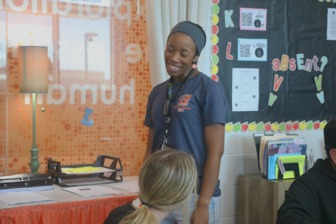 Bradley laughing with one of her students