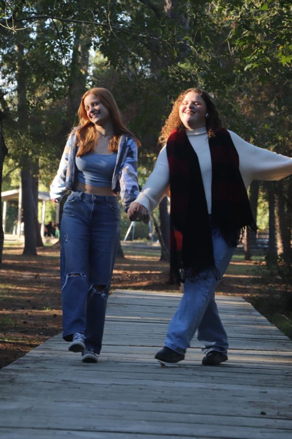 Sophomores Ava Robin and Ava McKelvey listen to Midnights together on a walk.