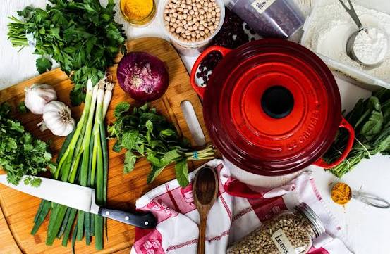 A multitude of vegetables in preparation of a home cooked meal. 